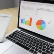 Open laptop displaying digital marketing analytics dashboard